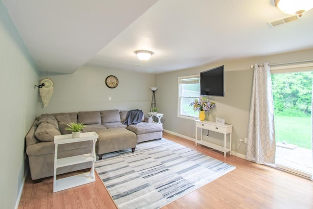 7640 W H Ave, Kalamazoo, MI 49009 - living room featuring wood finished floors and baseboards