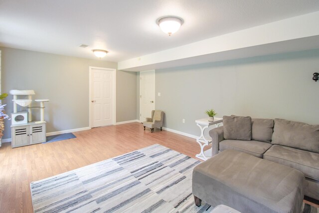 7640 W H Ave, Kalamazoo, MI 49009 - living area featuring light wood-style floors and baseboards