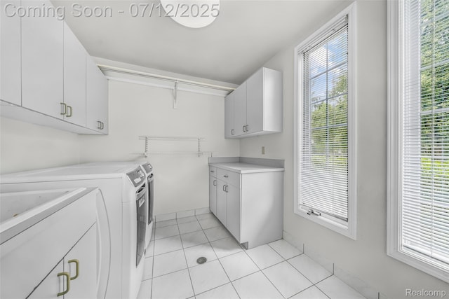 4532 Franklin Mill Rd, Southfield, MI 48301 - laundry area featuring cabinet space, independent washer and dryer, and light tile patterned floors