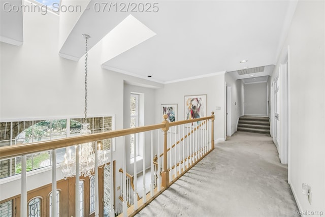 4532 Franklin Mill Rd, Southfield, MI 48301 - hall with a chandelier, an upstairs landing, carpet floors, ornamental molding, and recessed lighting