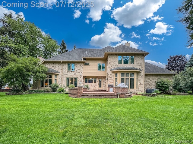 4532 Franklin Mill Rd, Southfield, MI 48301 - back of house featuring a chimney, a yard, and brick siding