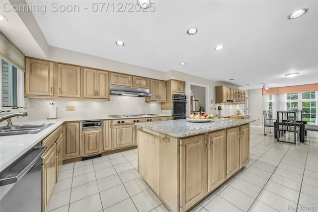 4532 Franklin Mill Rd, Southfield, MI 48301 - kitchen featuring stainless steel dishwasher, under cabinet range hood, a kitchen island, light tile patterned floors, and light stone counters