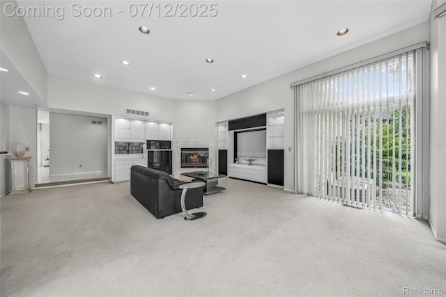 4532 Franklin Mill Rd, Southfield, MI 48301 - living area with healthy amount of natural light, light colored carpet, a fireplace, and recessed lighting