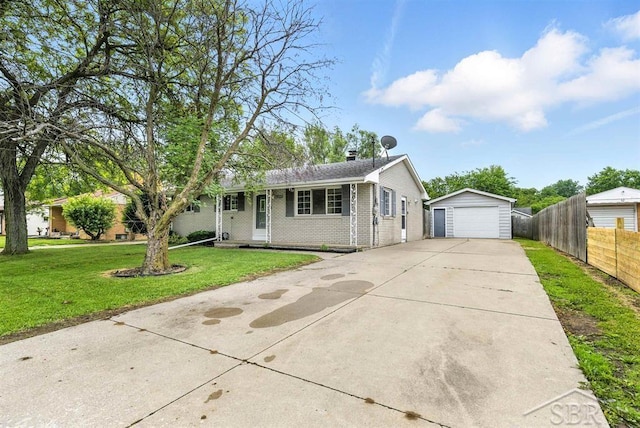 2295 Plainview Dr, Saginaw, MI 48603 - ranch-style house with brick siding, an outbuilding, a garage, and concrete driveway