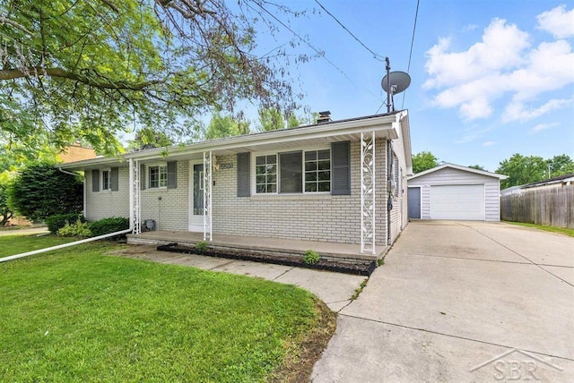 2295 Plainview Dr, Saginaw, MI 48603 - ranch-style house with brick siding, an outbuilding, and a detached garage