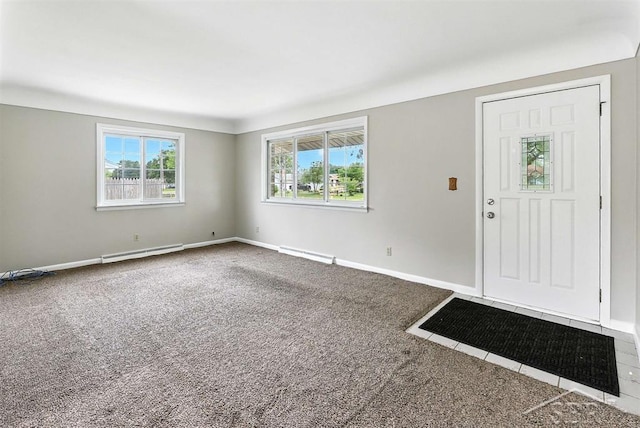 2295 Plainview Dr, Saginaw, MI 48603 - foyer with carpet, a baseboard heating unit, and a baseboard radiator