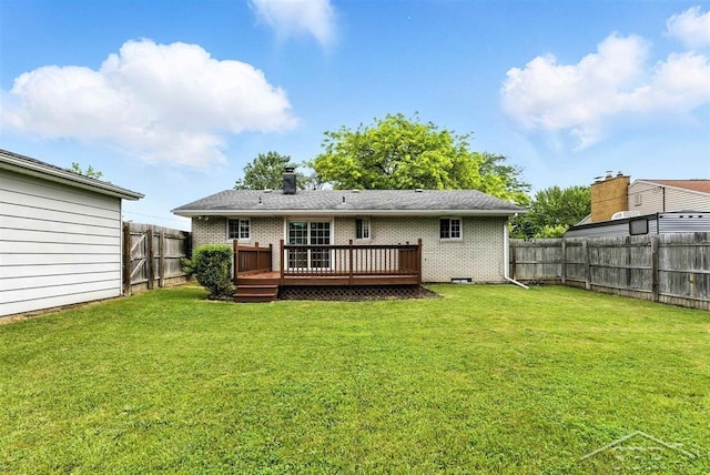 2295 Plainview Dr, Saginaw, MI 48603 - rear view of property with a fenced backyard, brick siding, and a deck