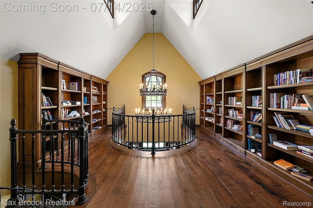 7420 Inner Circle Dr, Bloomfield Hills, MI 48301 - hallway with an upstairs landing, a chandelier, hardwood / wood-style floors, and vaulted ceiling
