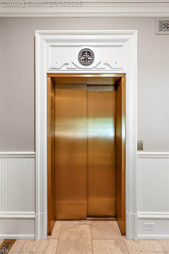 7420 Inner Circle Dr, Bloomfield Hills, MI 48301 - elevator featuring wainscoting and ornamental molding