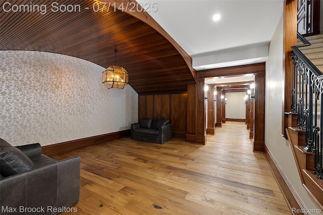 7420 Inner Circle Dr, Bloomfield Hills, MI 48301 - living room with stairway, vaulted ceiling, and light wood-type flooring