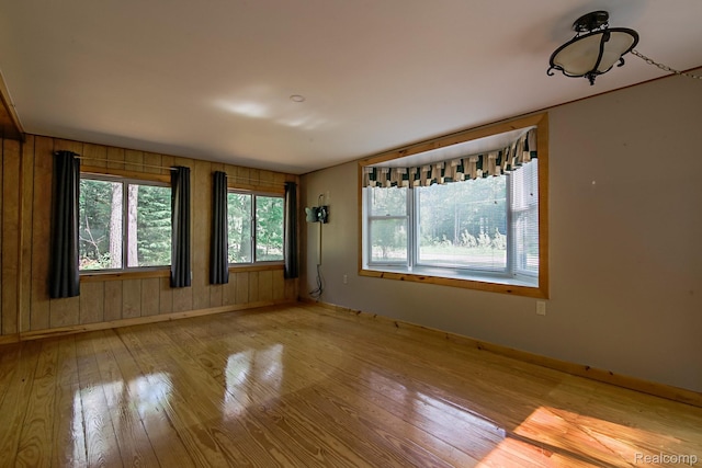 4176 Kings Corner Rd, Glennie, MI 48737 - spare room with hardwood / wood-style floors and baseboards