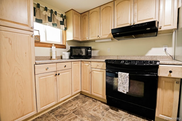 4176 Kings Corner Rd, Glennie, MI 48737 - kitchen featuring black appliances, under cabinet range hood, light brown cabinets, and light countertops