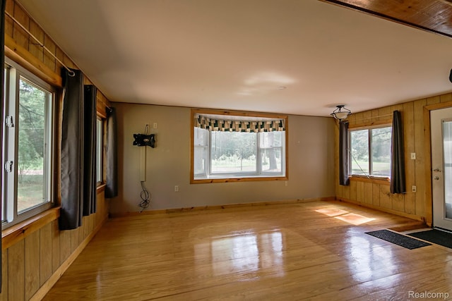 4176 Kings Corner Rd, Glennie, MI 48737 - foyer entrance featuring wood finished floors and wooden walls