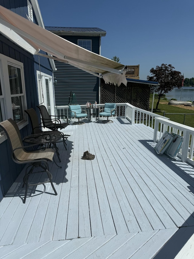 9500 Humphrey Rd, Reading, MI 49274 - wooden terrace featuring outdoor lounge area and a water view