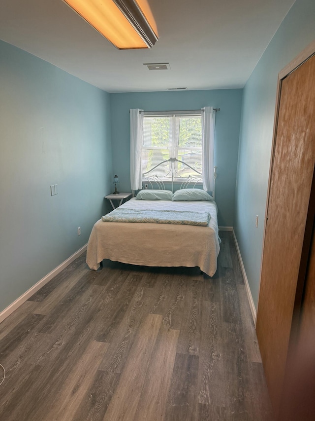 9500 Humphrey Rd, Reading, MI 49274 - bedroom featuring wood finished floors and baseboards