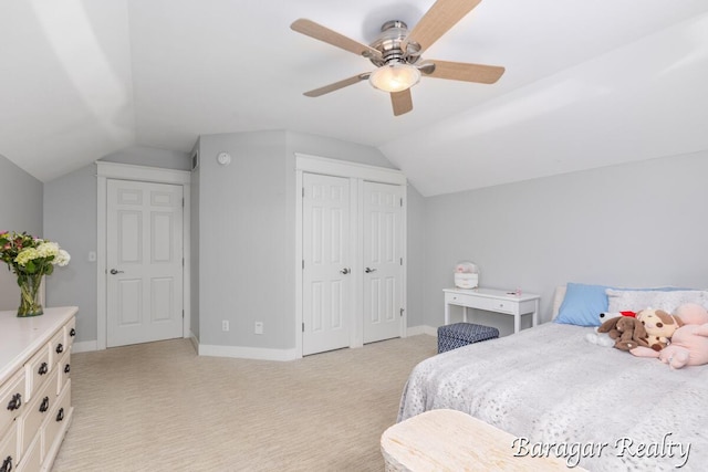 8790 Laurel Ridge Dr SE, Alto, MI 49302 - bedroom with vaulted ceiling, light carpet, a closet, and a ceiling fan