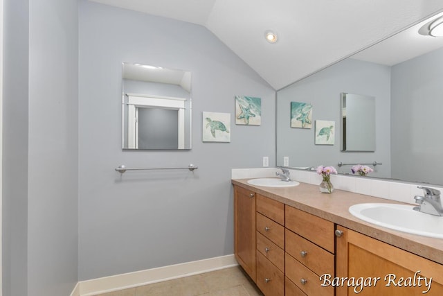 8790 Laurel Ridge Dr SE, Alto, MI 49302 - full bathroom featuring double vanity, vaulted ceiling, and tile patterned flooring