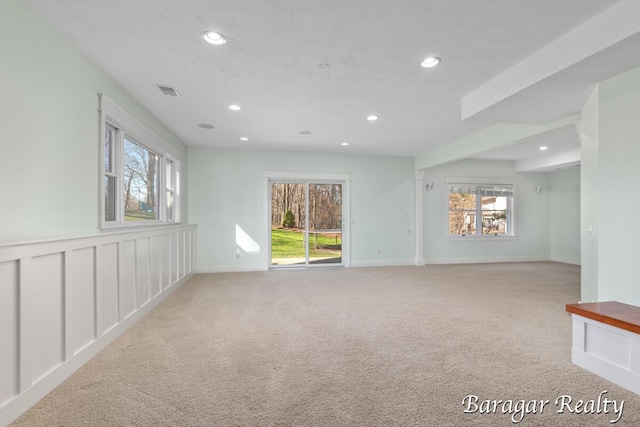 8790 Laurel Ridge Dr SE, Alto, MI 49302 - empty room with recessed lighting and light carpet