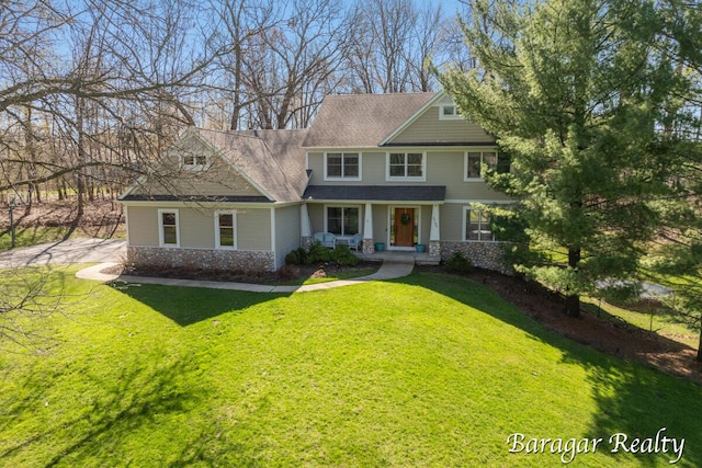 8790 Laurel Ridge Dr SE, Alto, MI 49302 - view of front facade with a front yard