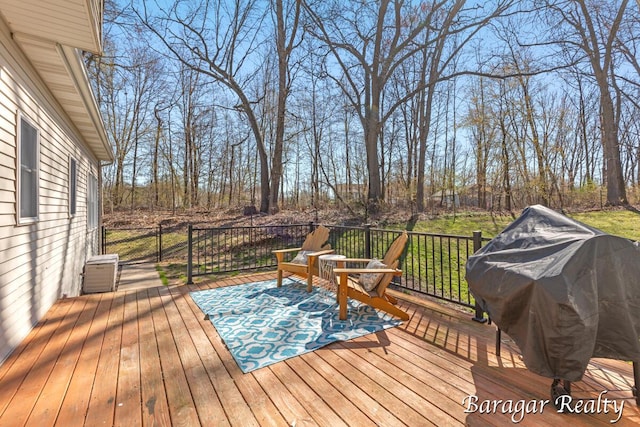8790 Laurel Ridge Dr SE, Alto, MI 49302 - wooden deck featuring area for grilling