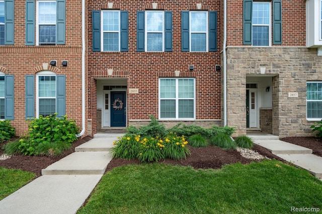 2855 Hardwick Rd, Ann Arbor, MI 48105 - view of front of house with stone siding and brick siding