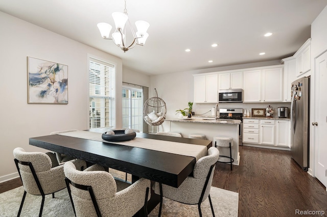 2855 Hardwick Rd, Ann Arbor, MI 48105 - dining room featuring dark wood finished floors, recessed lighting, and a chandelier