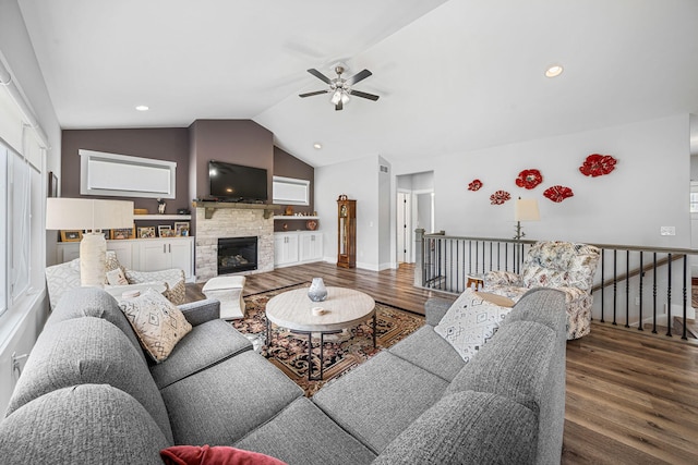 14170 Spring Valley Ct, Niles, MI 49120 - living area featuring wood finished floors, a ceiling fan, vaulted ceiling, and a fireplace