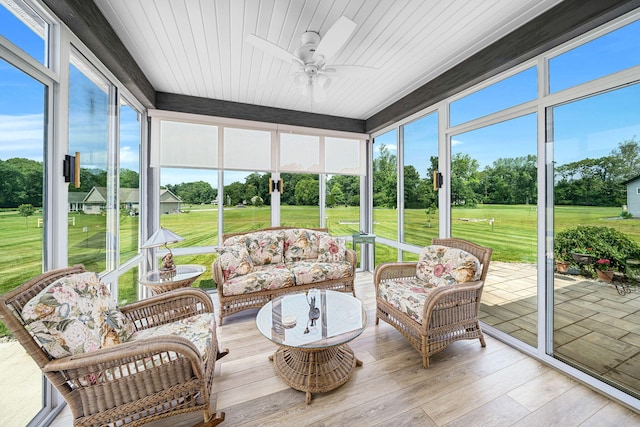14170 Spring Valley Ct, Niles, MI 49120 - sunroom with ceiling fan, plenty of natural light, and view of wooded area