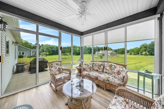 14170 Spring Valley Ct, Niles, MI 49120 - sunroom / solarium featuring ceiling fan, an outdoor hangout area, and view of scattered trees