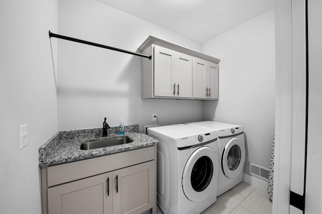 14170 Spring Valley Ct, Niles, MI 49120 - washroom with cabinet space and separate washer and dryer