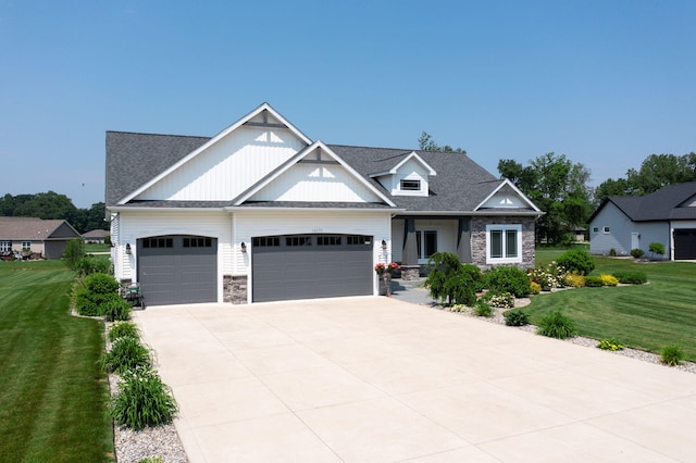 14170 Spring Valley Ct, Niles, MI 49120 - craftsman-style home with stone siding, a garage, and a front lawn