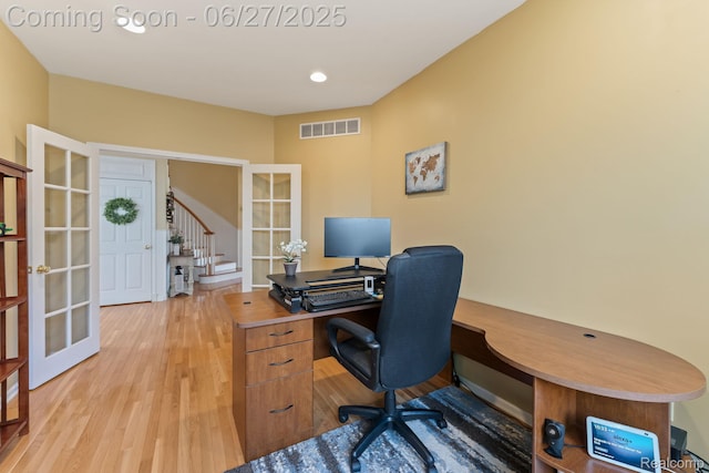 6060 Balmoral Way, Commerce Twp, MI 48382 - office area with french doors and light wood-style floors