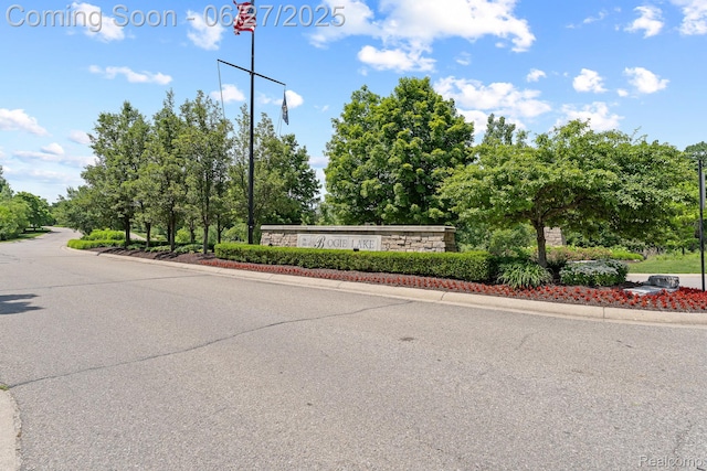 6060 Balmoral Way, Commerce Twp, MI 48382 - community sign featuring view of scattered trees