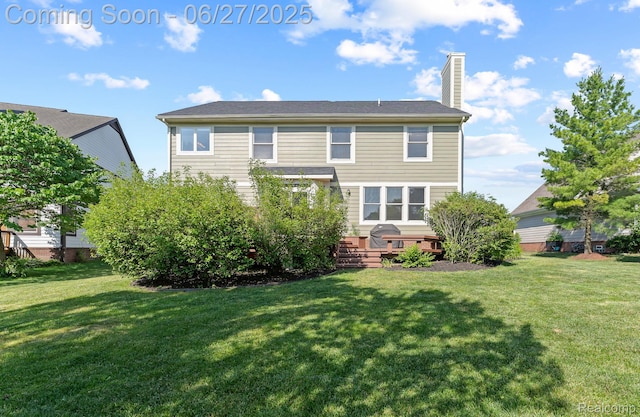 6060 Balmoral Way, Commerce Twp, MI 48382 - rear view of property with a yard, a chimney, and a deck