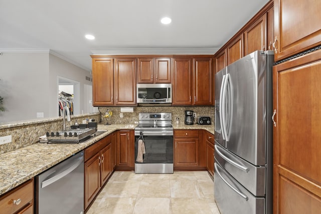 6733 Boulder Pointe Dr, Washington, MI 48094 - kitchen featuring stainless steel appliances, ornamental molding, backsplash, light stone countertops, and brown cabinetry