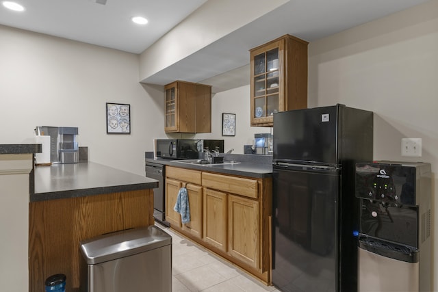 6733 Boulder Pointe Dr, Washington, MI 48094 - kitchen featuring black appliances, dark countertops, brown cabinets, light tile patterned floors, and glass insert cabinets
