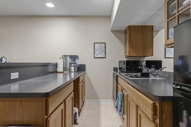 6733 Boulder Pointe Dr, Washington, MI 48094 - kitchen with dark countertops, glass insert cabinets, light tile patterned floors, recessed lighting, and brown cabinetry