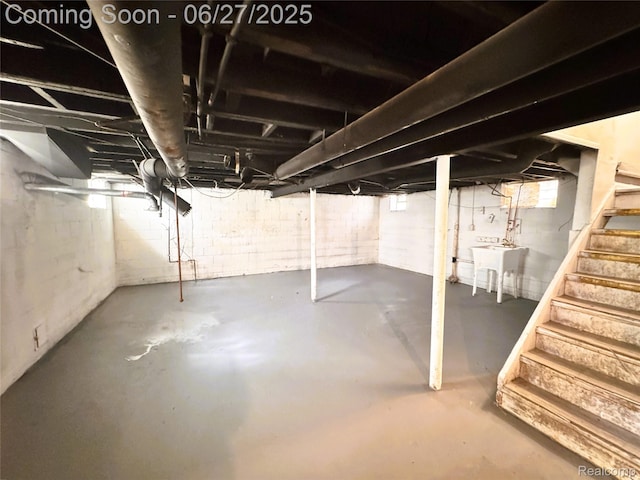 9646 Ward St, Dearborn, MI 48227 - below grade area with a sink and stairway