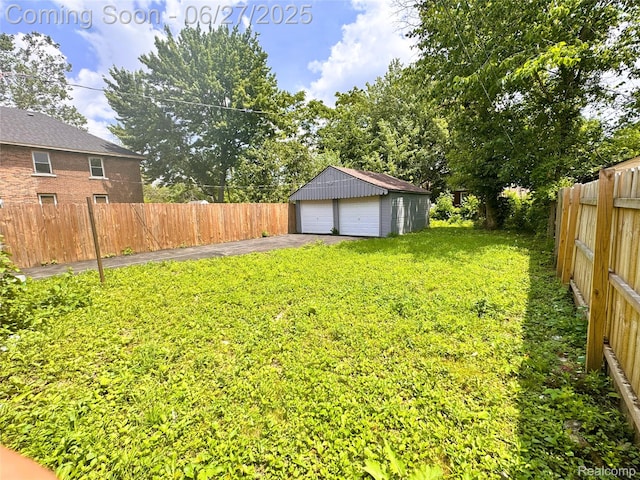 9646 Ward St, Dearborn, MI 48227 - fenced backyard with a garage and an outdoor structure