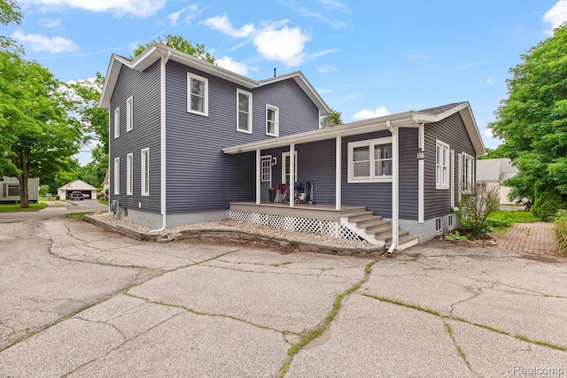 830 College Ave, Adrian, MI 49221 - view of front of property featuring covered porch
