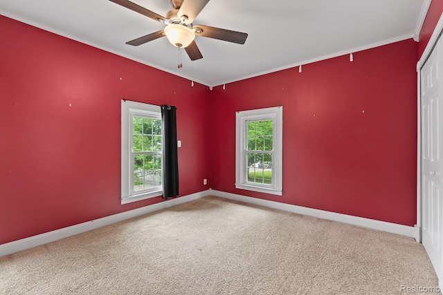 830 College Ave, Adrian, MI 49221 - carpeted empty room featuring crown molding and ceiling fan