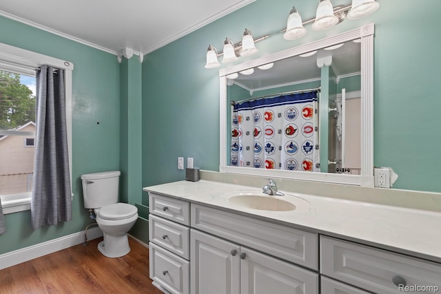 830 College Ave, Adrian, MI 49221 - full bathroom with vanity, ornamental molding, and wood finished floors