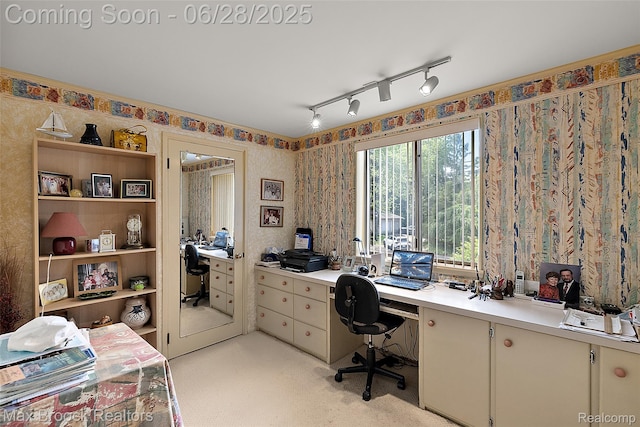 4848 Willow Ln, Orchard Lake, MI 48324 - office area featuring built in desk, wallpapered walls, light colored carpet, and track lighting