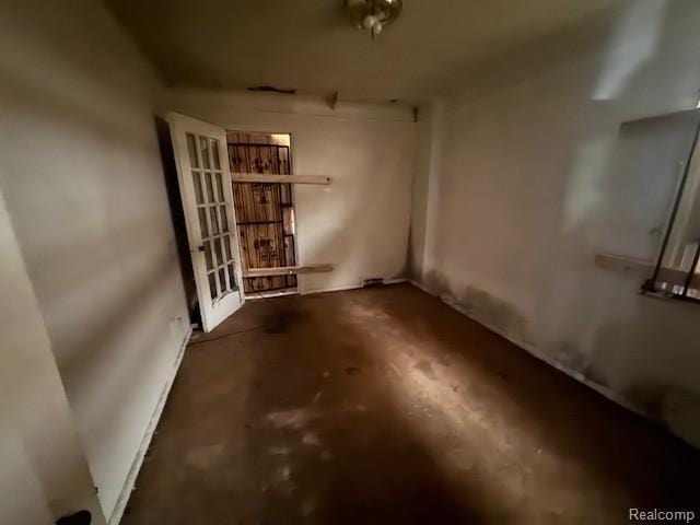 18460 Ferguson St, Detroit, MI 48235 - empty room featuring concrete flooring