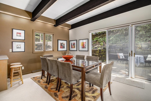 1917 Benjamin Ave, Kalamazoo, MI 49008 - dining room featuring light colored carpet, beamed ceiling, and plenty of natural light