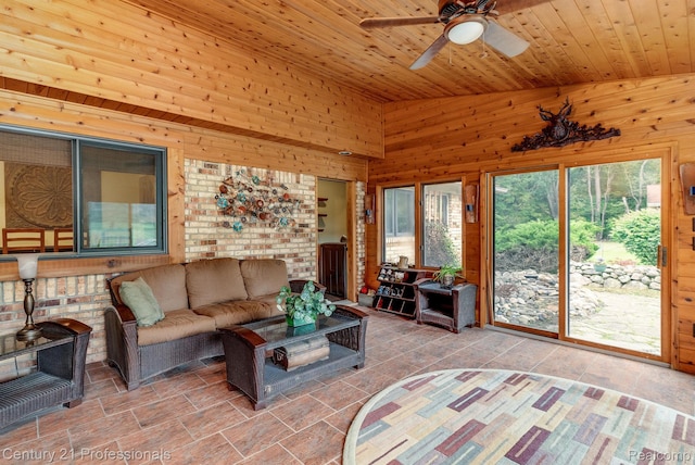 9601 Kier Rd, Holly, MI 48442 - living area featuring wooden walls, a ceiling fan, vaulted ceiling, and wooden ceiling