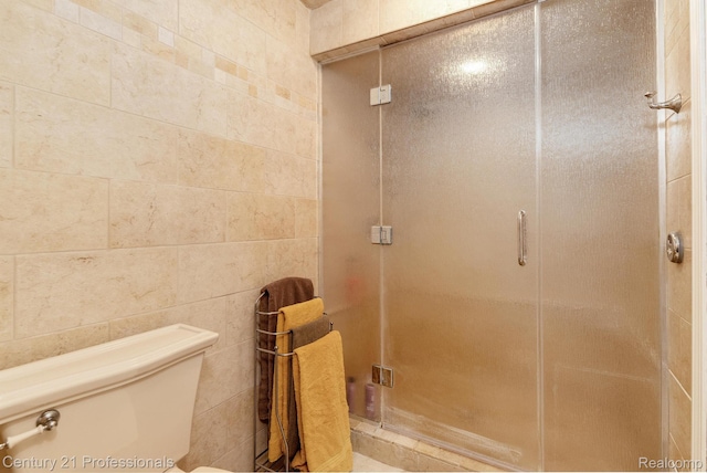 9601 Kier Rd, Holly, MI 48442 - bathroom featuring tile walls and a stall shower