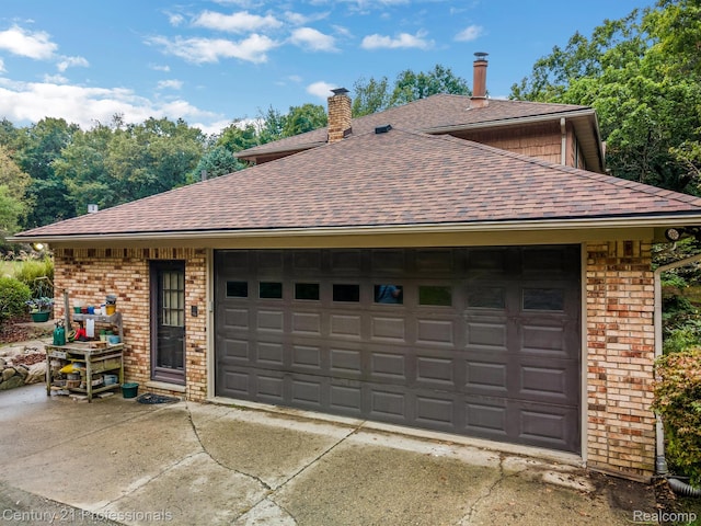 9601 Kier Rd, Holly, MI 48442 - garage with driveway