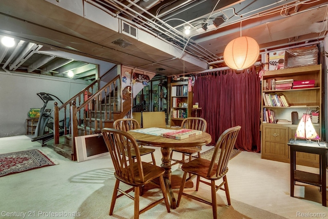 9601 Kier Rd, Holly, MI 48442 - dining area with stairs and carpet