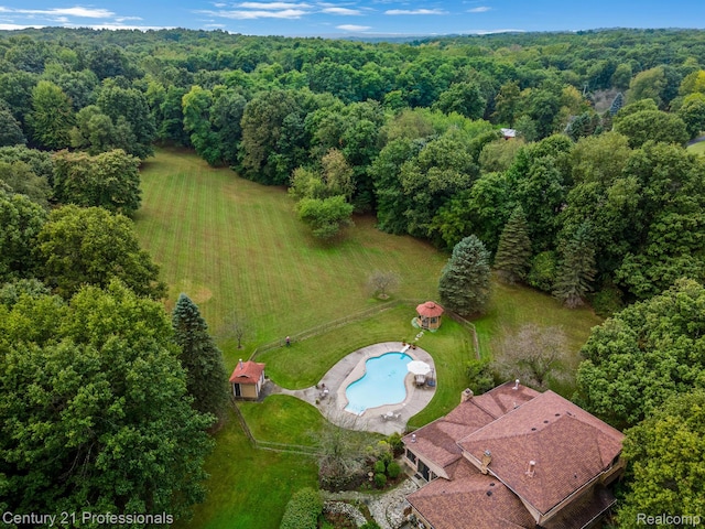 9601 Kier Rd, Holly, MI 48442 - aerial view of property and surrounding area featuring a pool area and a forest